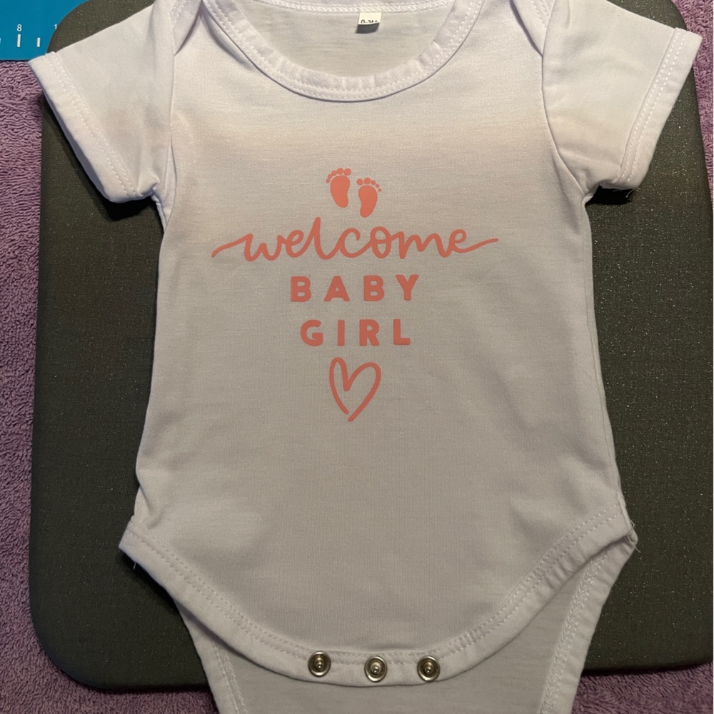 Cricut homemade baby onesie.